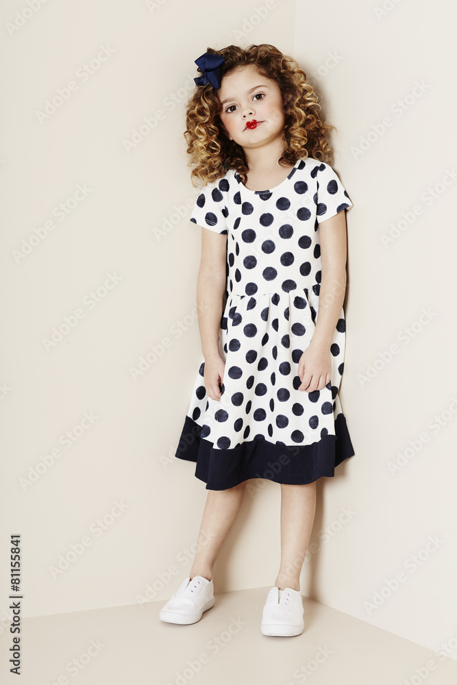 Pensive girl in spots Pensive girl in spots