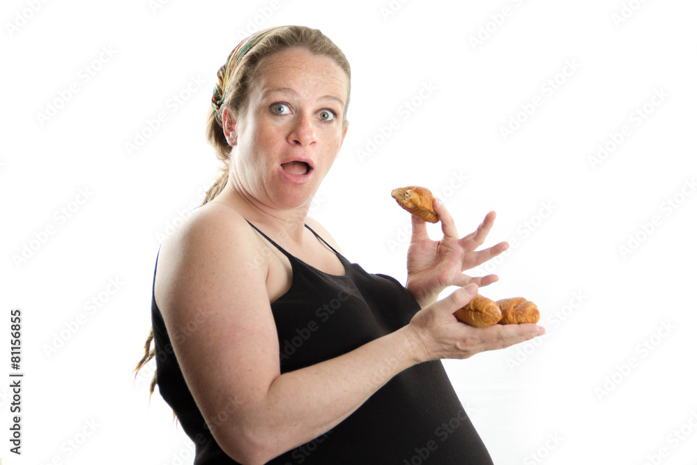 pregnant woman eating fast food, croissant, too much isolated on pregnant woman eating fast food, croissant, too much isolated on