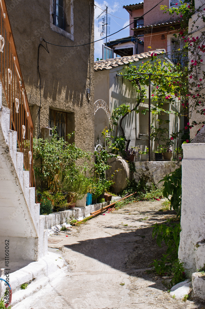 Narrow street in the village - Valanio, Corfu, Greece