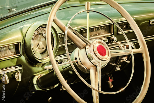 Retro styled image of the interior of a classic car © Martin Bergsma