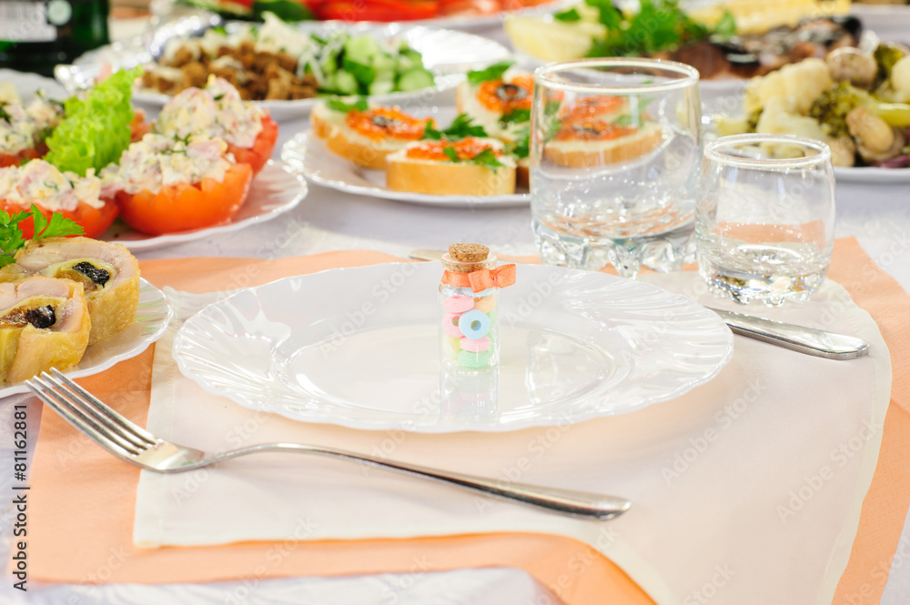 table set service with silverware and glass stemware at restaurant before party table set service with silverware and glass stemware at restaurant before party