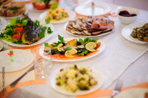 Fototapeta Naklejka Na Ścianę i Meble -  table set service with silverware and glass stemware at restaurant before party
