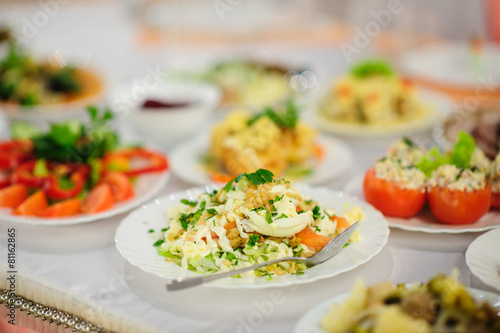 table set service with silverware and glass stemware at restaurant before party