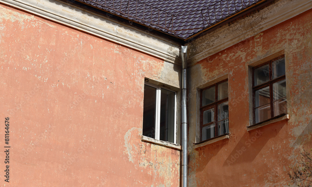 Windows on the wall of an old house Windows on the wall of an old house