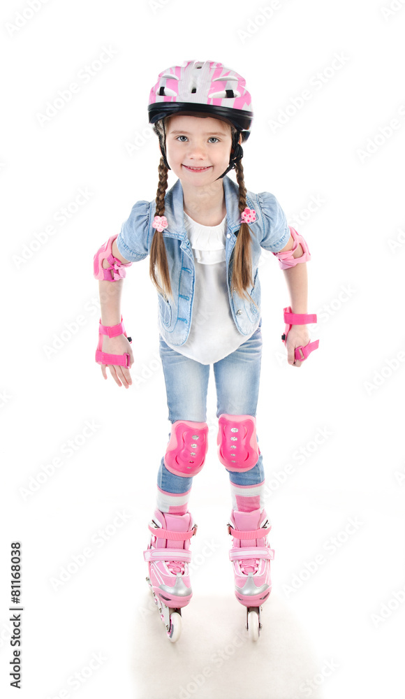 Cute smiling little girl in pink roller skates Cute smiling little girl in pink roller skates