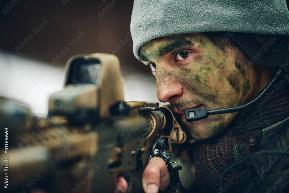 armed man in camouflage with sniper gun armed man in camouflage with sniper gun