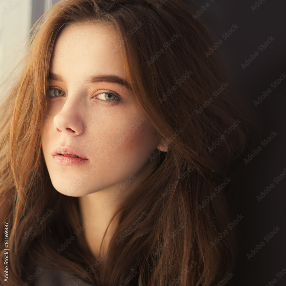 portrait of a beautiful young woman close up portrait of a beautiful young woman close up