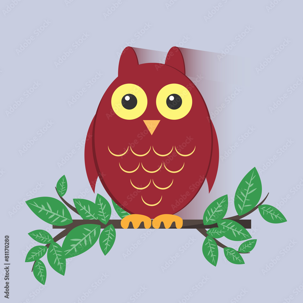 Red Owl Sitting on a Branch