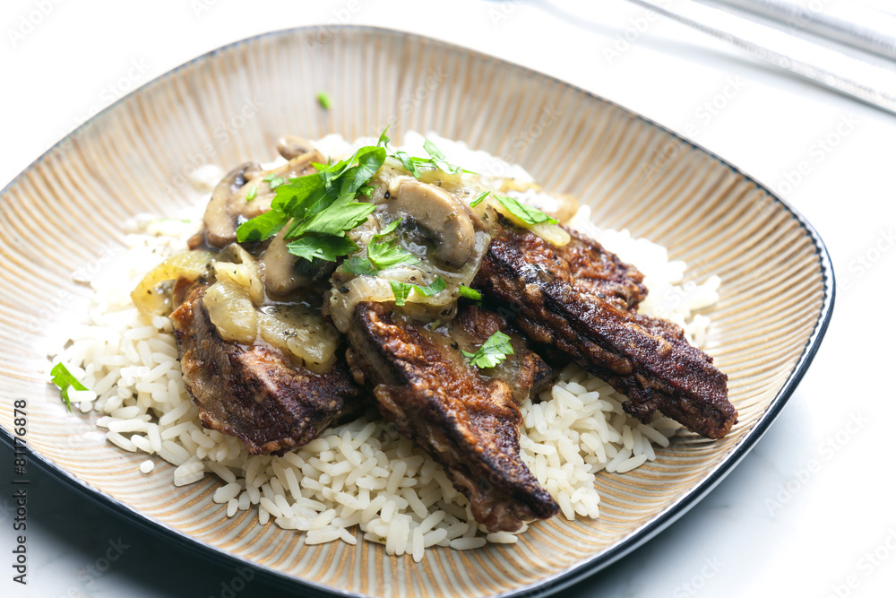 fried livres with mushroom sauce and rice fried livres with mushroom sauce and rice