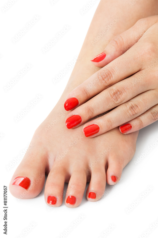 Woman with beautiful red finger and toenails Woman with beautiful red finger and toenails