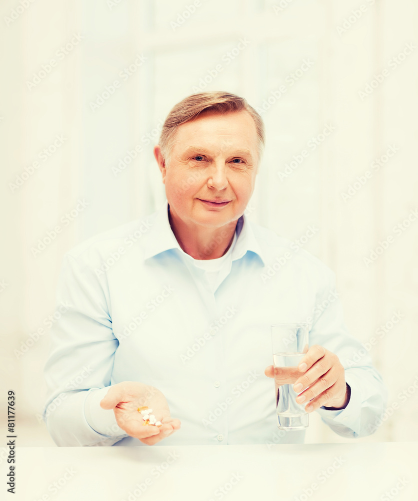 old man with pills ang glass of water old man with pills ang glass of water