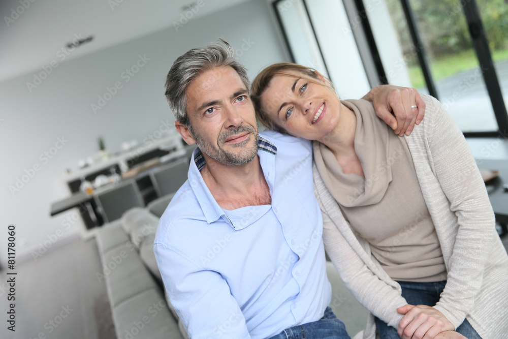 Portrait of mature couple relaxing at home Portrait of mature couple relaxing at home
