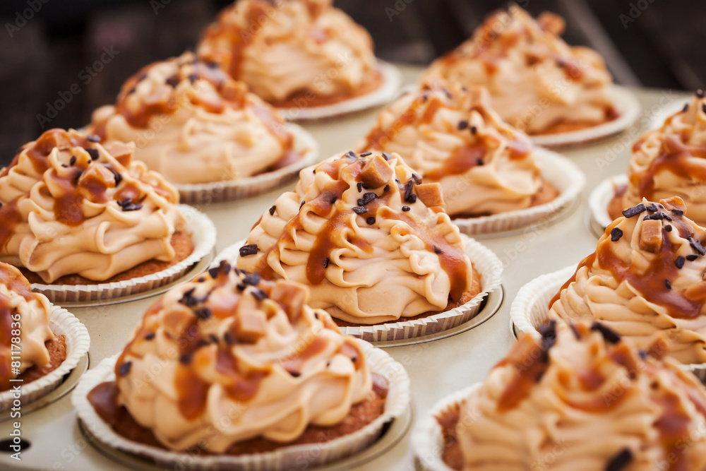 Caramel cupcakes on a baking tray Caramel cupcakes on a baking tray