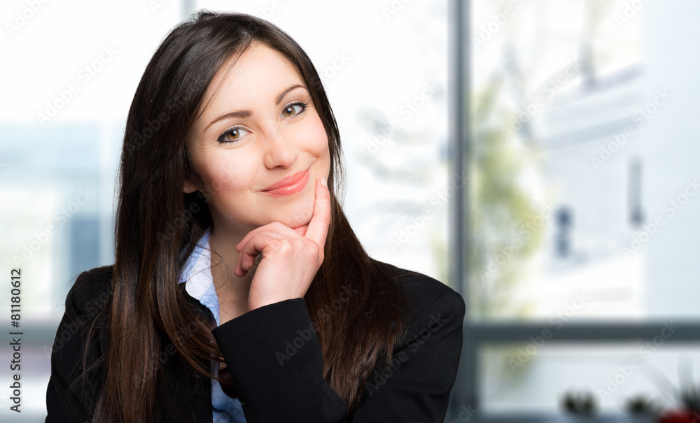 Smiling young female manager portrait Smiling young female manager portrait