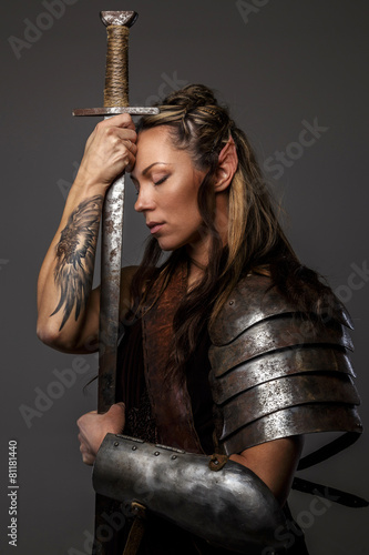Elf woman holding sword