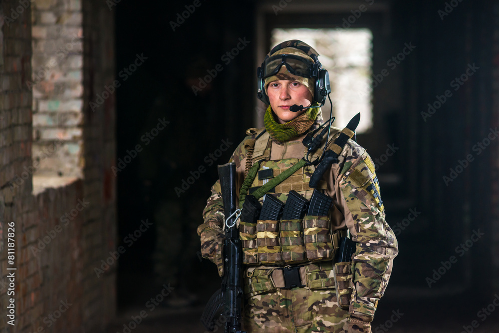 Airsoft strikeball player in military soilder uniform Airsoft strikeball player in military soilder uniform