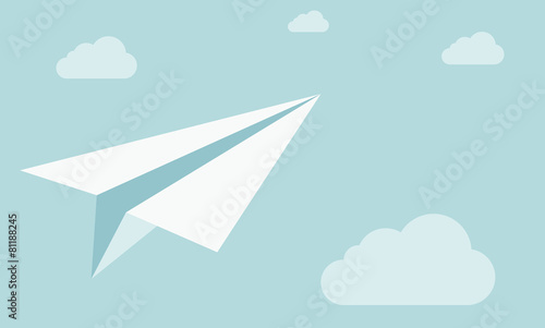 Paper plane on the sky with clouds.