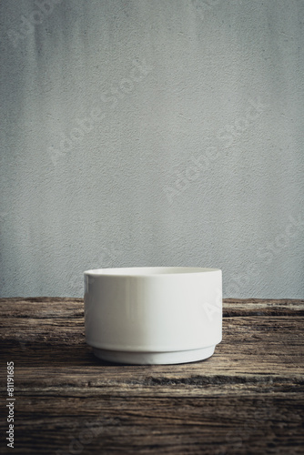 Empty little bowl on wooden tabletop