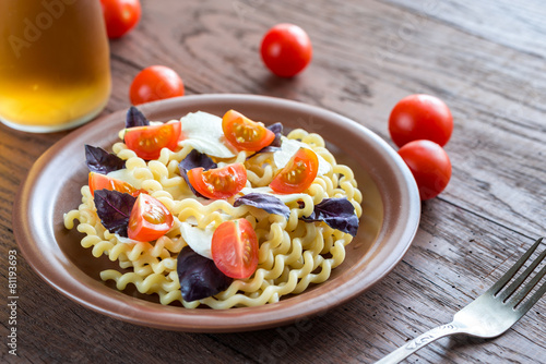 Fusilli lunghi with cheese and cherry tomatoes