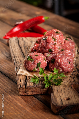 Close-up of fresh meatballs on wooden board