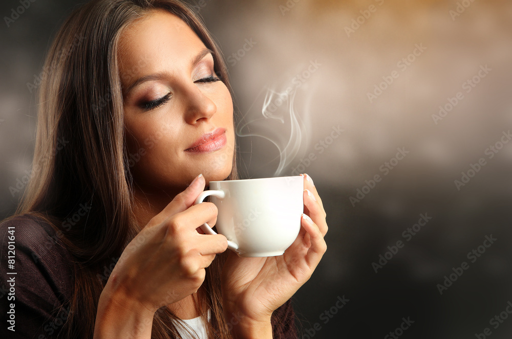 Beautiful young woman with cup of coffee Beautiful young woman with cup of coffee