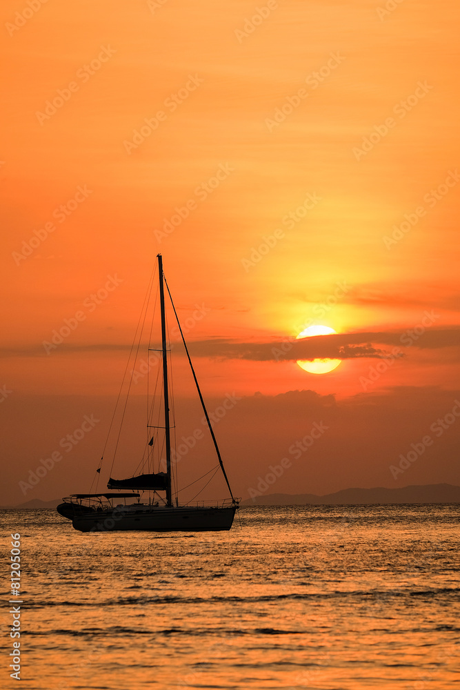 The sailboats were anchored for the evening to watch the sunset