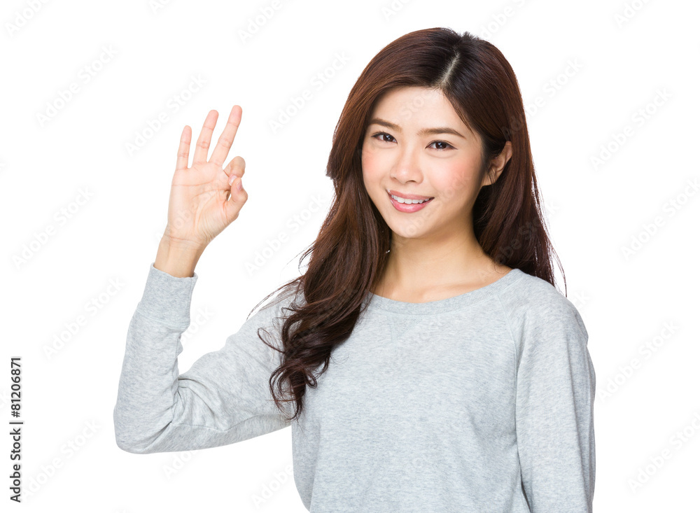 Pretty young woman doing the ok sign Pretty young woman doing the ok sign