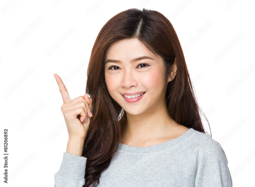 Young woman pointing her finger Young woman pointing her finger
