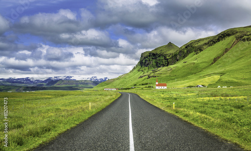 Icelandic mountain landscapes with asphalt road