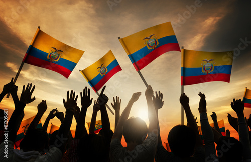 Silhouettes of People Holding Flag of Ecuador Concept photo