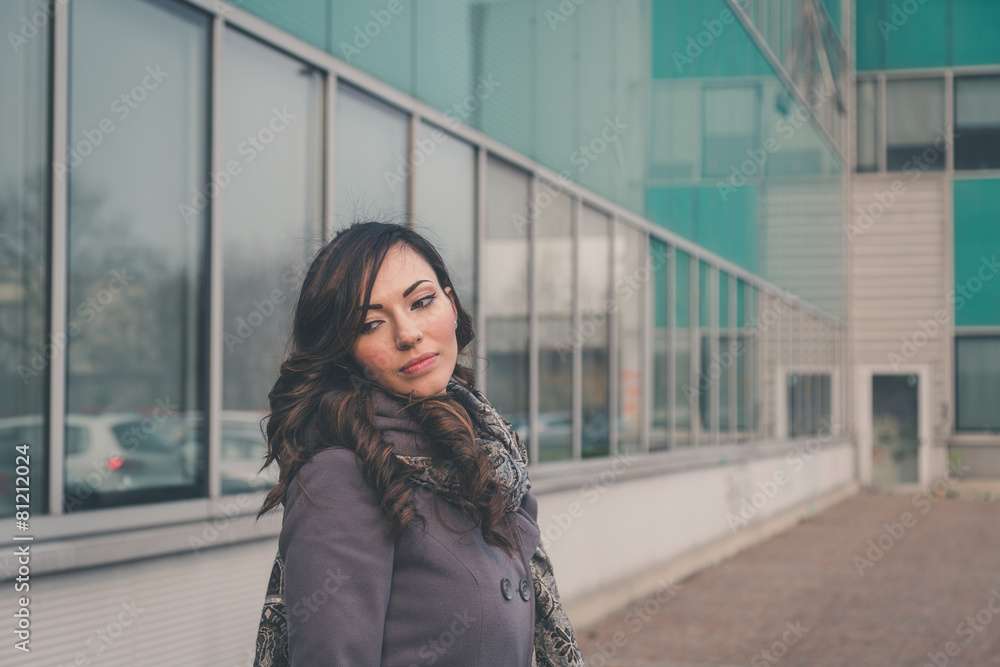 Beautiful girl posing in an urban context Beautiful girl posing in an urban context