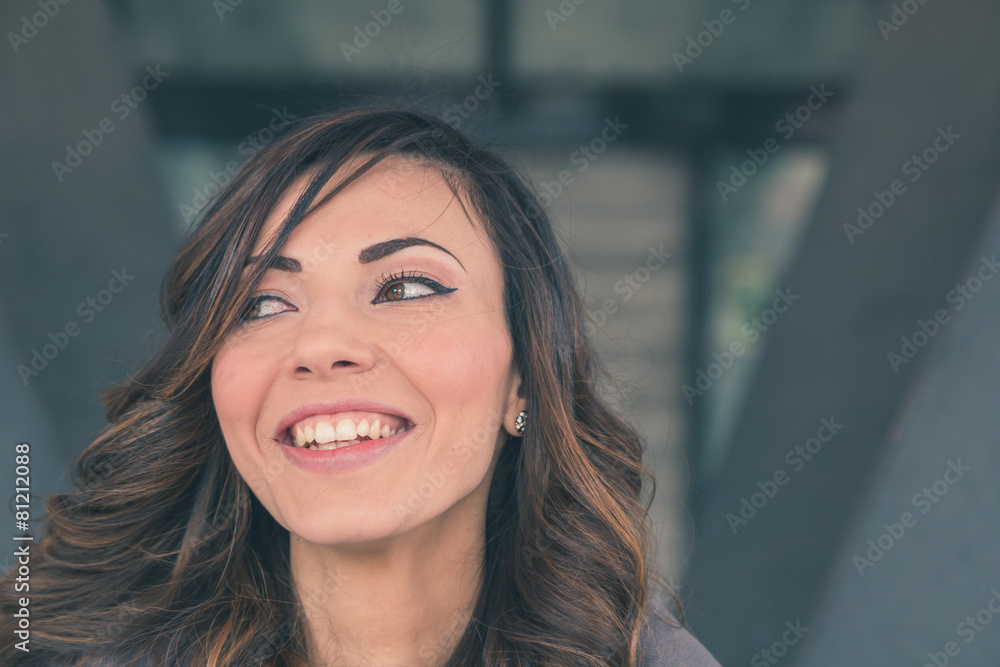 Beautiful girl posing in an urban context Beautiful girl posing in an urban context