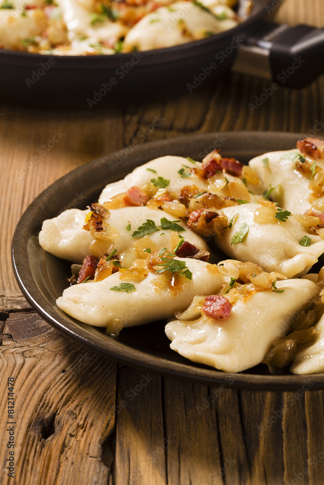 Delicious homemade dumplings with onion and bacon Delicious homemade dumplings with onion and bacon