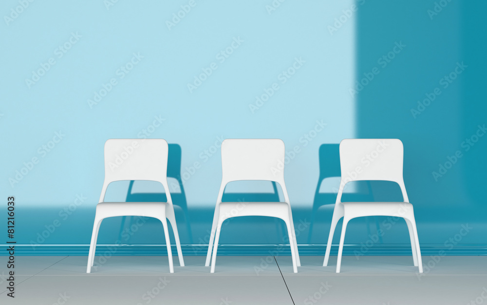Fototapeta premium Three modern chairs in a blue room
