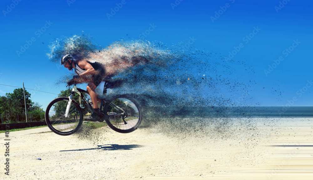 Fototapeta premium Pro moutain bike racer running so fast!