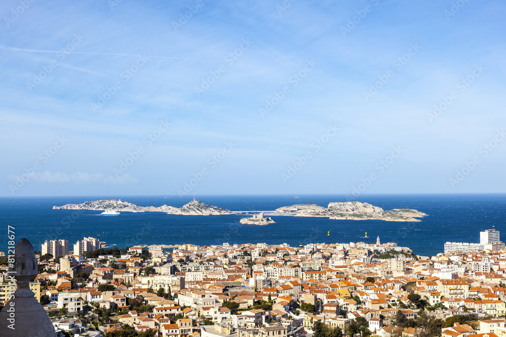 aerial view of one of the Frioul islands and the town of Marseil