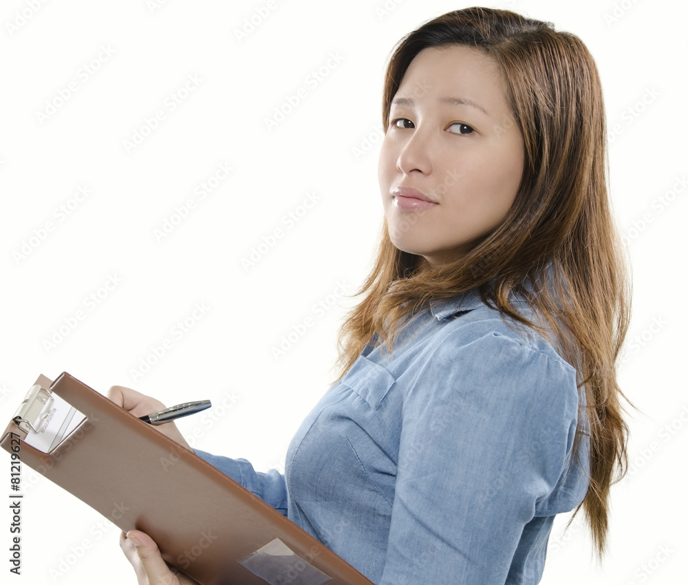 Beautiful secretary writing a note Beautiful secretary writing a note