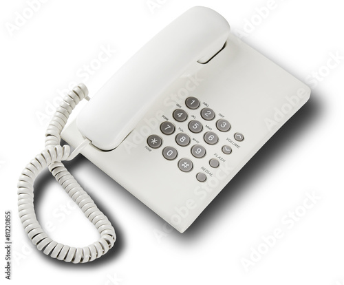 White office telephone against white background