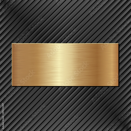 golden plaque on black textured background