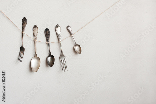 Cutlery hangs on the string