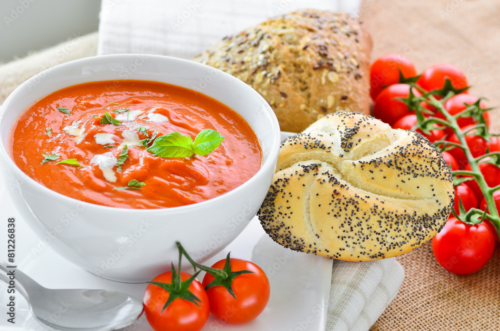 Fresh tomato soup and fresh baked crusty bread rolls. Stock Photo | Adobe  Stock