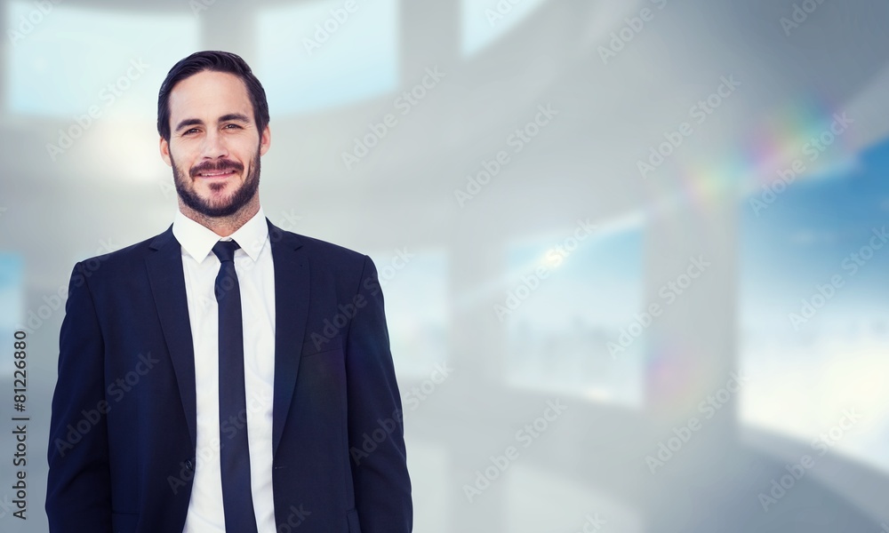 businessman in suit standing with hands in pockets businessman in suit standing with hands in pockets