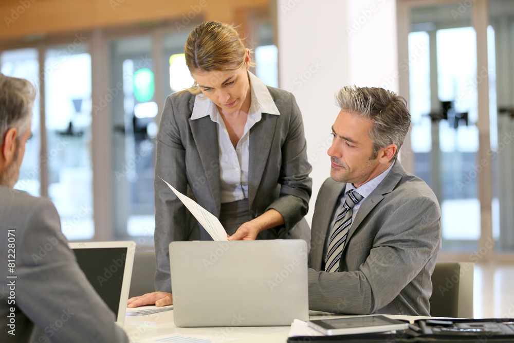 Businesspeople in a work meeting Businesspeople in a work meeting