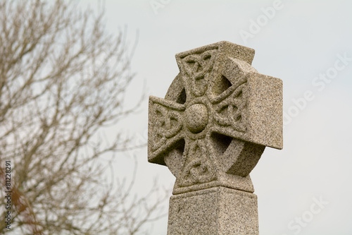 Принти на полотні Celtic cross gravestone in churchyard