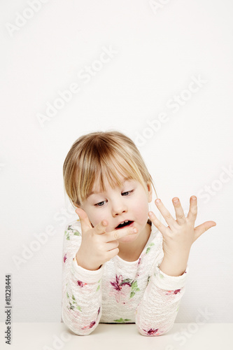Girl counting fingers