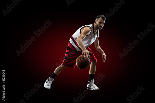 Basketball player in action is flying high © 103tnn