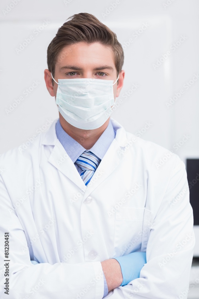 Scientist standing arms crossed and looking at camera Scientist standing arms crossed and looking at camera