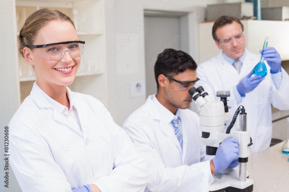 Smiling scientist looking at camera Smiling scientist looking at camera