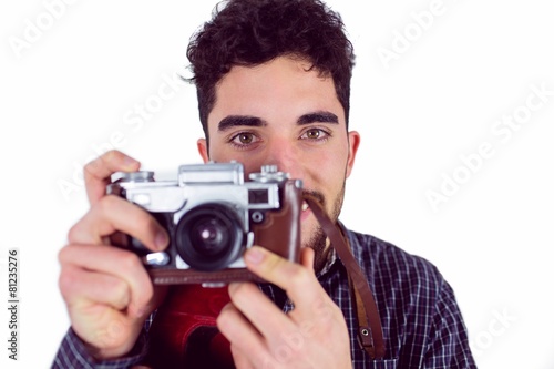 Casual man taking a photo