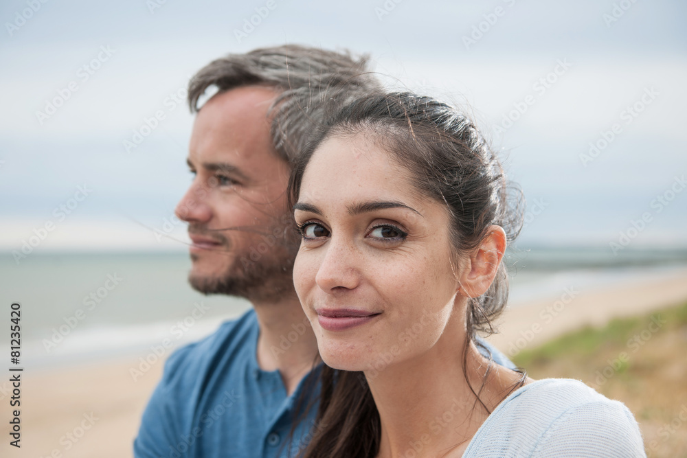 Portrait of a beautiful couple at the beach